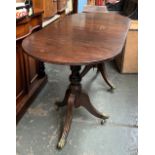 An unusually small D end table, each section on turned column support and three swept legs, with