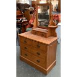 A chest of drawers/dressing table, comprising adjustable mirror, over two short over two long