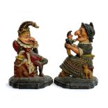 A pair of 19th century painted cast iron Punch and Judy doorstops, each approx. 30cmH