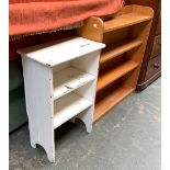 A small white painted bookshelf, 52x30x79cmH; together with one other retailed by Phoenix of