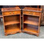 A pair of nightstands, single drawer over two shelves, on bracket feet, 47x27x70cm