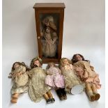 Two Armand Marseille dolls marked '390', one in glass display case; Two vintage china and