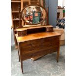 A mahogany dressing table, adjustable mirror and pier drawers over three long drawers, on square