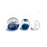 A Selkirk glass paperweight together with two others (3)