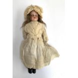 An Armand Marseille doll marked 'AM 370'