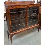 An astragal glazed mahogany bookcase with three adjustable shelves, 135x36x134cmH