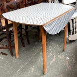 A mid century gingham formica topped drop leaf table, approx. 100cmW