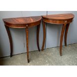 A pair of Reprodux demilune sidetables, with swept legs, 60x30.5x17cmH