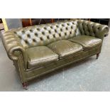 A green leather buttonback three seater Chesterfield sofa, approx. 180cmW