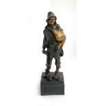 A bronze statue of a man with bagpipes 'Lieber Augustin', 39cmH
