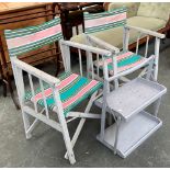 A pair of folding grey painted deck chairs; together with a folding double shelf, 54cmW