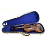 A full sized violin in a vintage fitted case, 14" two piece back