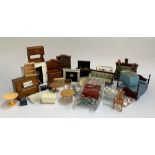 A mixed lot of dolls house furniture, to include upright piano, fireplace, range/stove, dresser,