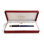 A Cartier ballpoint pen in fitted case, engraved 006918 to lid