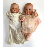 Two Armand Marseille bisque head baby dolls