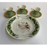 Three Royal Worcester green coffee cups heightened in gilt, reg no. 651926; together with an