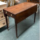 A mahogany Pembroke table, single end drawer, on square tapered legs with brass caps and casters,