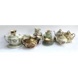 A mixed lot of teawares to include Royal Crown Derby style teapot with crown mark to base, numbered