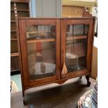 A 19th century glazed mahogany hanging shelf, 76cmW