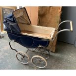 A vintage coach built pram