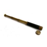 A brass and leather three draw telescope, extended length 41cm