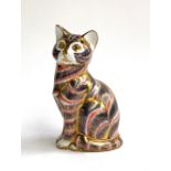 A Royal Crown Derby cat Imari pattern paperweight, 12.5cmH