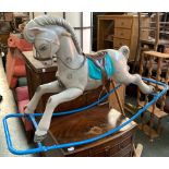 A moulded plastic rocking horse on metal runners, 131cmL