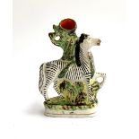 A Staffordshire flatback spill vase in the form of a zebra, 20cmH