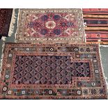 A Turkmen prayer mat, 141x82cm; together with one other small rug, 107x70cm