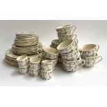 A ceramic tea set comprising teacups, saucers, egg cups, approx. 50 pieces