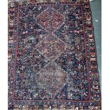 A West Persian rug with three lozenges, 175x136cm