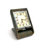 A Le Coultre eight day folding leather travelling clock (af)