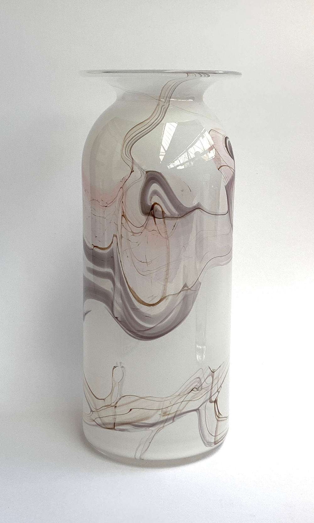 A contemporary opaque Art Glass vase by Anthony Stern, of cylindrical form with flared rim,