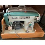 A Jonelle JLP2 sewing machine, in carry case