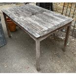 A teak garden table, 130x80x75cmH