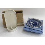 Four boxed Wedgwood commemorative plates; together with a pair of boxed wall hanging candle holders
