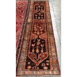 A Kurdish runner rug, 330x90cm