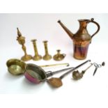 A mixed lot of brass and copper items to include watering can; candlesticks; pans; hanging candle