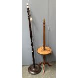 Two turned wood standard lamps, one with dish table top, on tripod legs, approx. 130cmH and