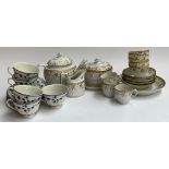 A 19th century white and gilt part tea set, comprising teapot, sugar bowl, milk jug, cake plate,