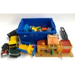 A mixed lot of toy cars and other vehicles to include Matchbox, Lesney, Corgi; a toy garage bulding,