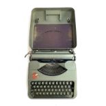 An empire Aristocrat portable typewriter