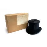A Lock & Co. black silk top hat in original box, size 7 1/4, 20.5x16cm