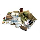 A heavy duty canvas satchel, a canteen in canvas bag, hat, soap, military dubbin wax; a set of