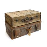 A vintage leather suitcase, 70x41x25cm; together with one other canvas and leather suitcase,