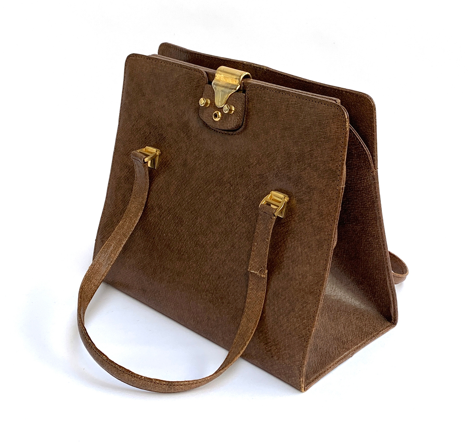 A 1950s brown leather handbag (damage to one strap)