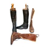 A pair of black leather gent's hunting boots with trees and spur supports; together with a pair of
