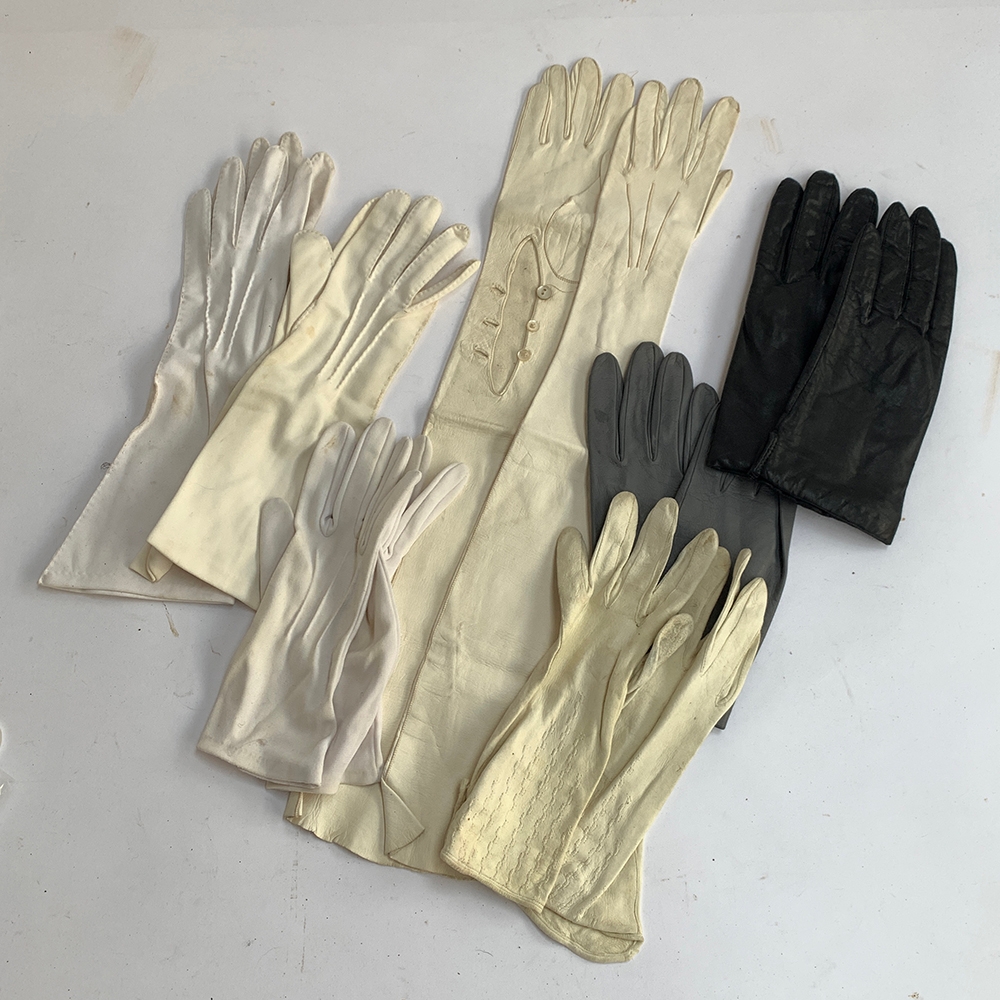 Seven pairs of ladies gloves, leather and cloth, one elbow length