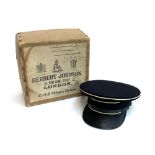 A military peeked cap from Herbert Johnson, in original box