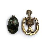 A brass fox mask and horseshoe door knocker, 14.5cm; together with another hunting knocker with